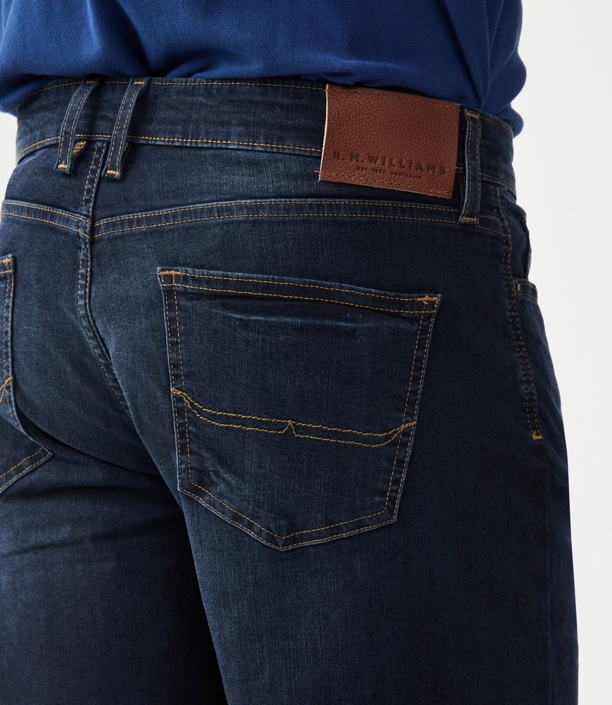 R.M.Williams - Nicholson Denim Short - Indigo showcasing the branded leather patch and back pocket detail.