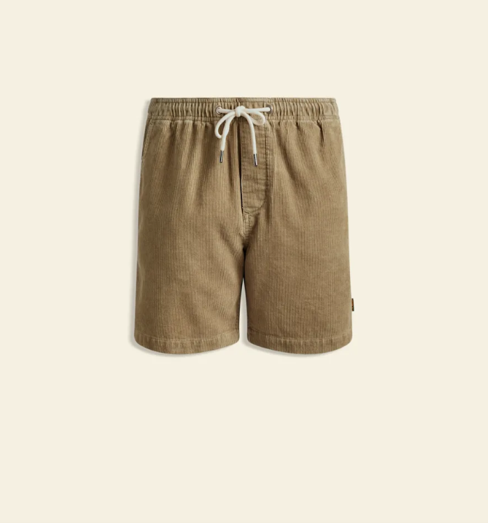 A pair of men's corduroy shorts in a warm khaki-tan color, featuring an elastic waistband with a white drawstring, shown against a solid cream background.