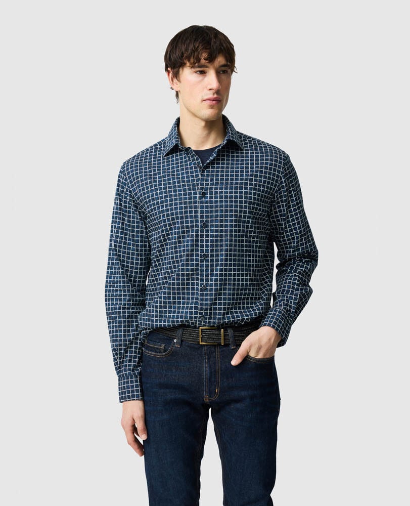 Rodd & Gunn - Sail Rock Shirt - Midnight, featuring a classic windowpane check design on a navy base worn casually.