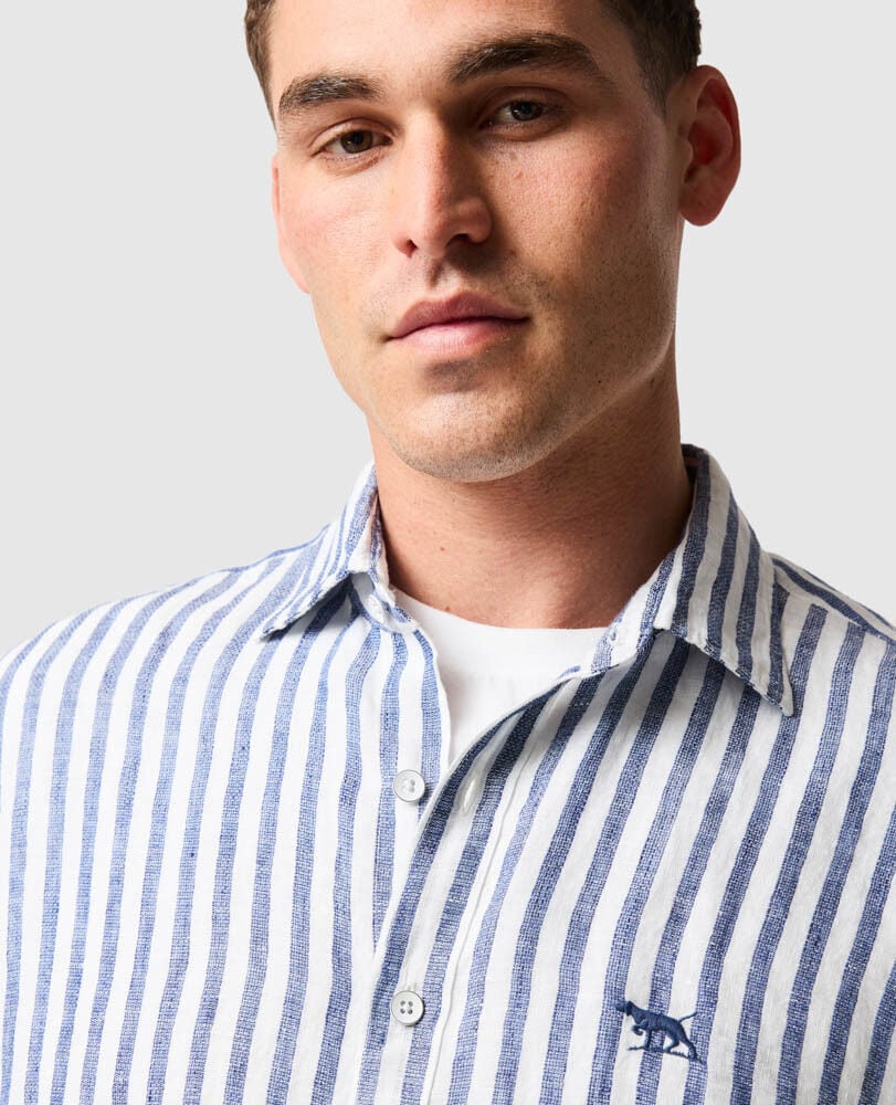Rodd & Gunn - Seadown Linen Shirt - Stripe - French Navy worn by a model with a modern fit and vertical stripes.