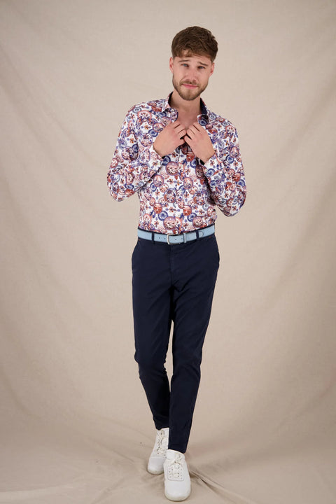 A Fish Named Fred - Desert World Shirt - White & Cobalt Multi worn by a model, styled with navy pants and white shoes.