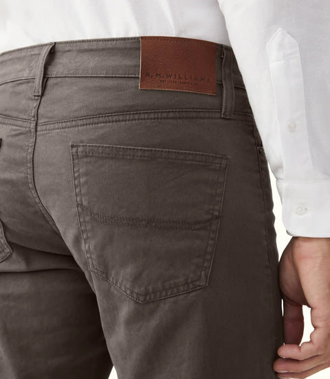 R.M.Williams - Loxton 5 Pocket Jean - Silt featuring the branded leather waist badge and back pockets.