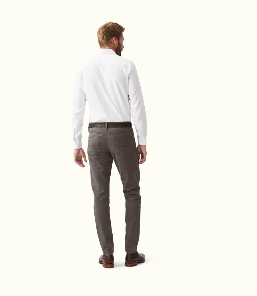 R.M.Williams - Loxton 5 Pocket Jean - Silt worn by a model from the back, showcasing the tapered fit and detail.