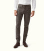 R.M.Williams - Loxton 5 Pocket Jean - Silt worn by a model, showcasing a closer fit and tapered leg, paired with brown boots.