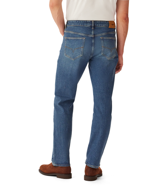 R.M.Williams - Ramco Jean - Vintage Indigo showcasing the back view with five pockets and signature branded hardware.