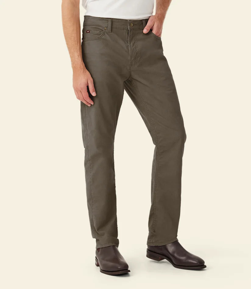 R.M.Williams - Ramco 5 Pocket Jean - Silt worn by a model, showcasing a versatile straight-leg style.