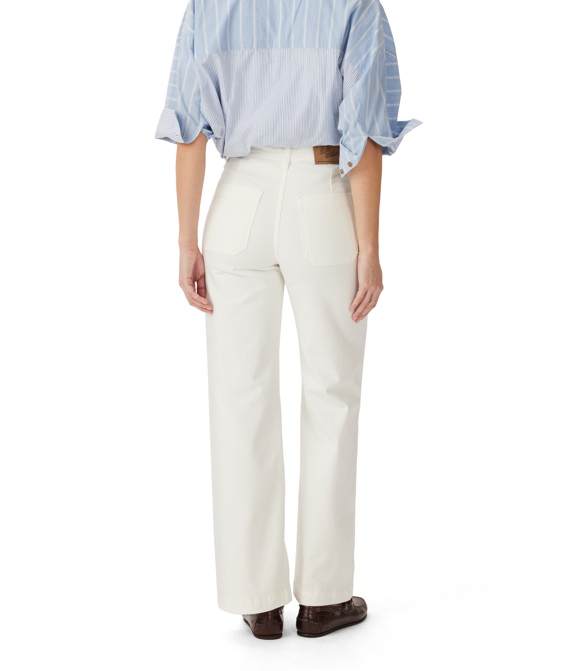 Back view of a woman wearing R.M.Williams - Jesse Jean - White, showcasing the relaxed fit and wide leg style.