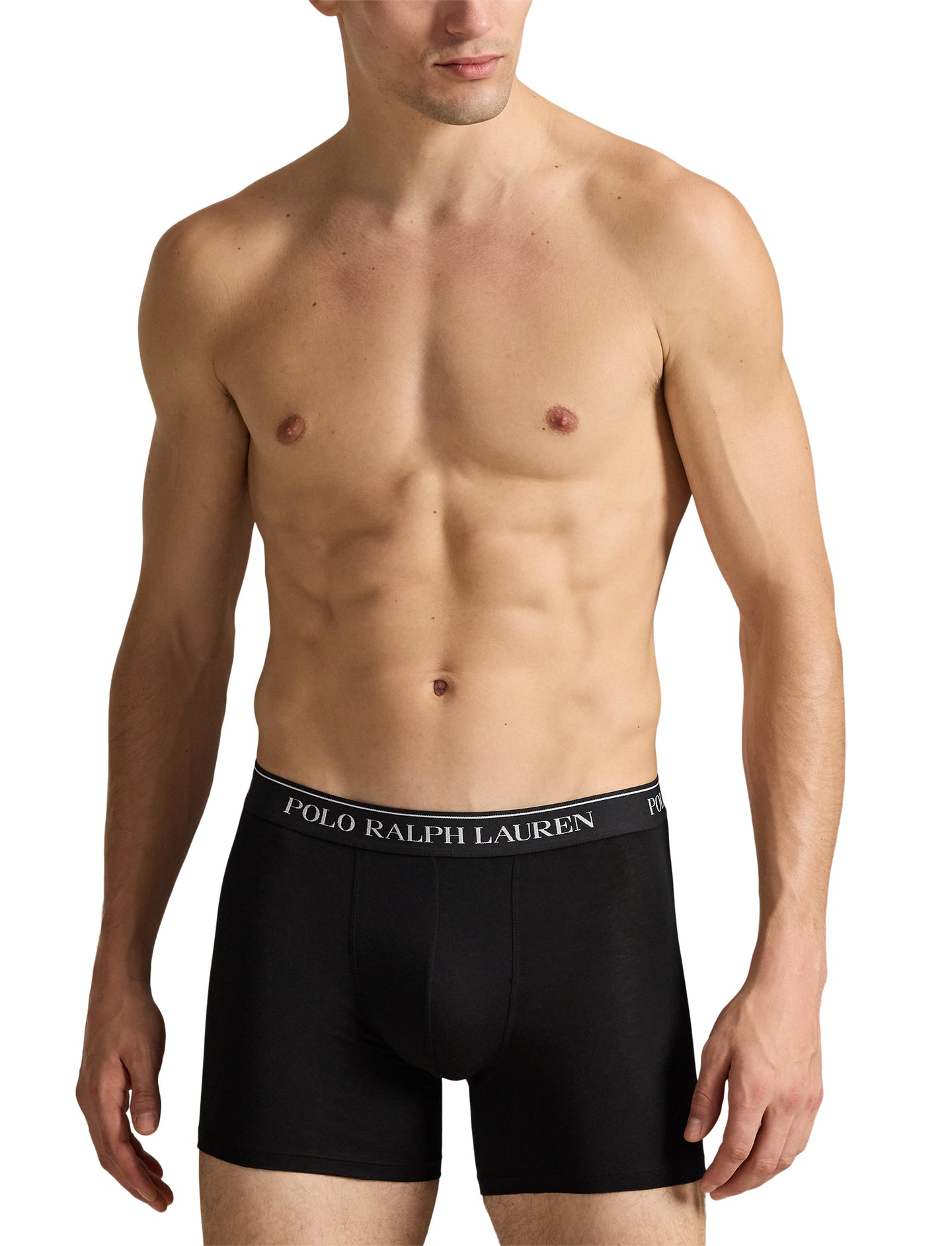 Polo Ralph Lauren - Classic Cotton Stretch Boxer Trunks - 3 Pack - Black modeled by a man in black boxer trunks.