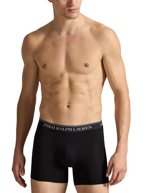 Polo Ralph Lauren - Classic Cotton Stretch Boxer Trunks - 3 Pack - Black modeled by a man in black boxer trunks.